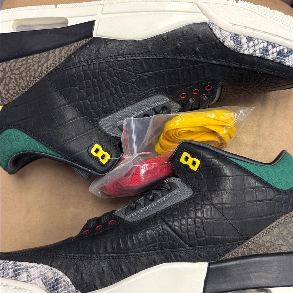 Jordan Low-Top Sneakers in Black with Red, Yellow, and Green Accents